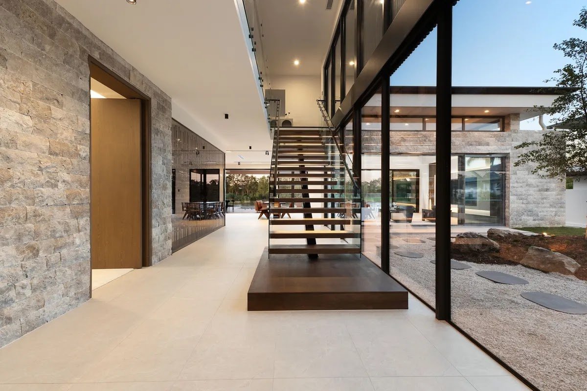 Floating hardwood timber staircase with underside LED lighting built by Yushin Kim
